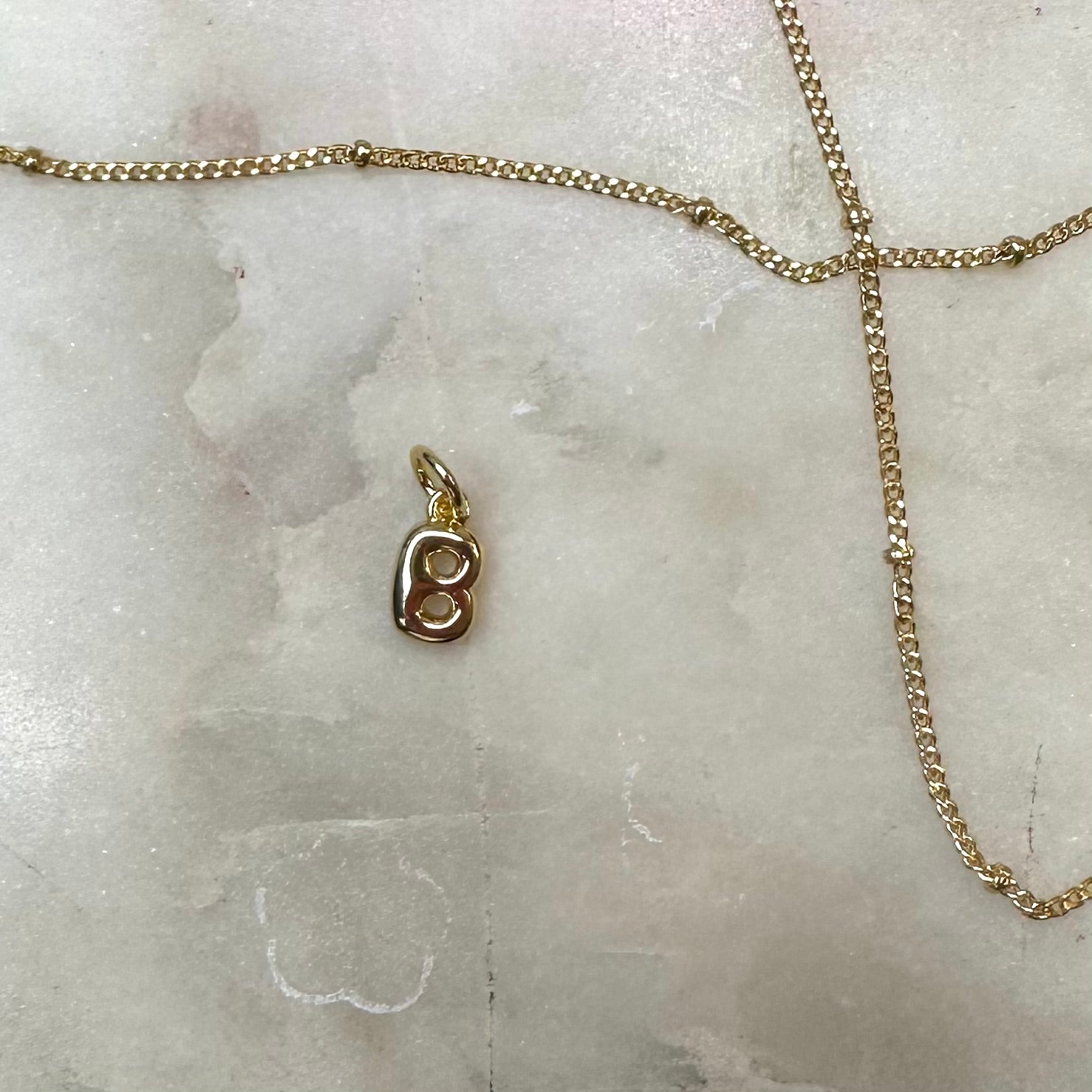 Step 2: Sara Initial Charms