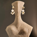 Load image into Gallery viewer, Golden Shell Dangles
