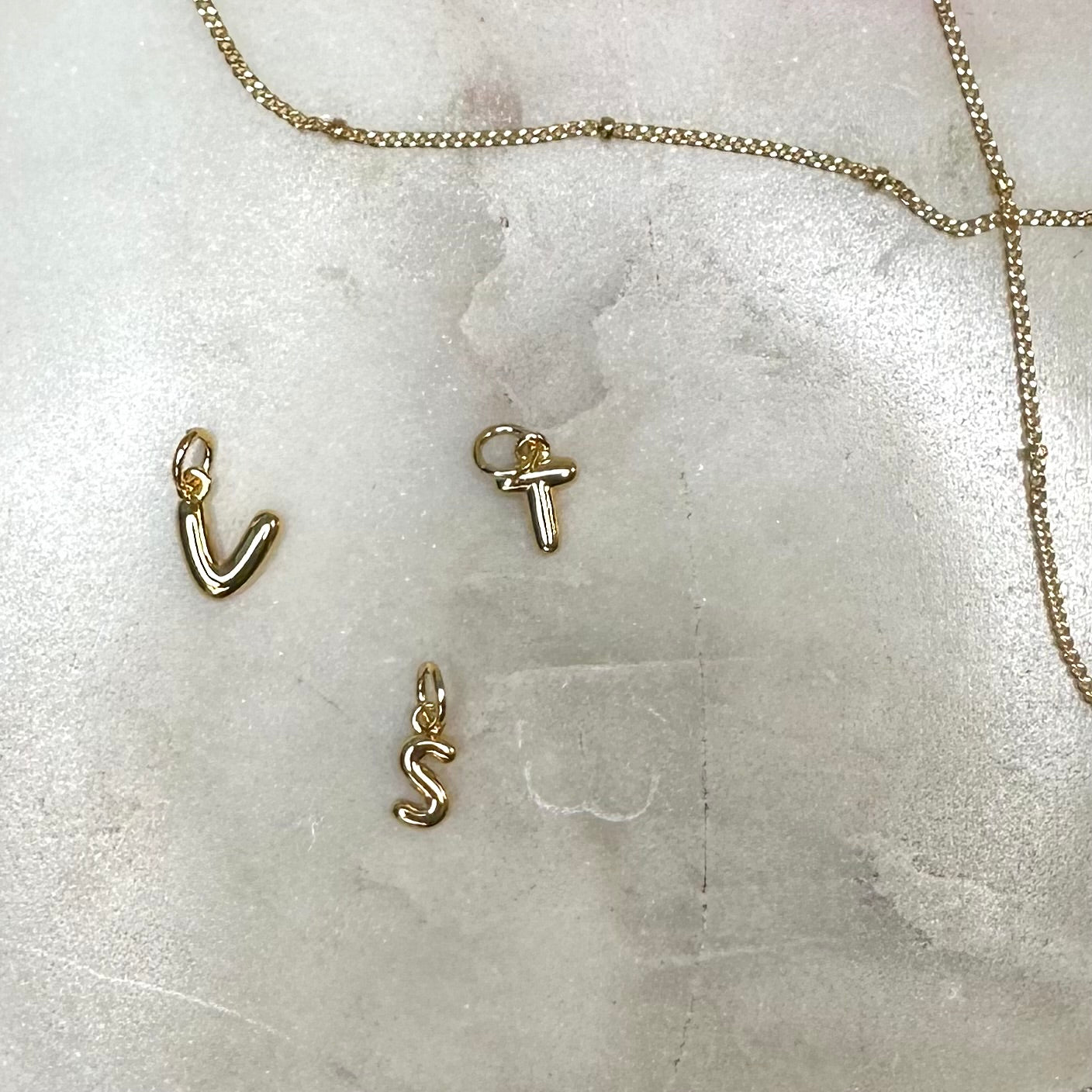 Step 2: Sara Initial Charms